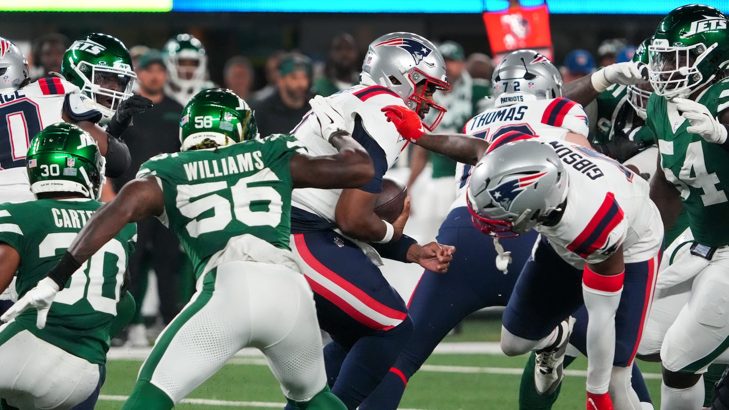 Patriots quarterback Jacoby Brissett (No. 7) was sacked five times against the Jets, who registered seven overall.