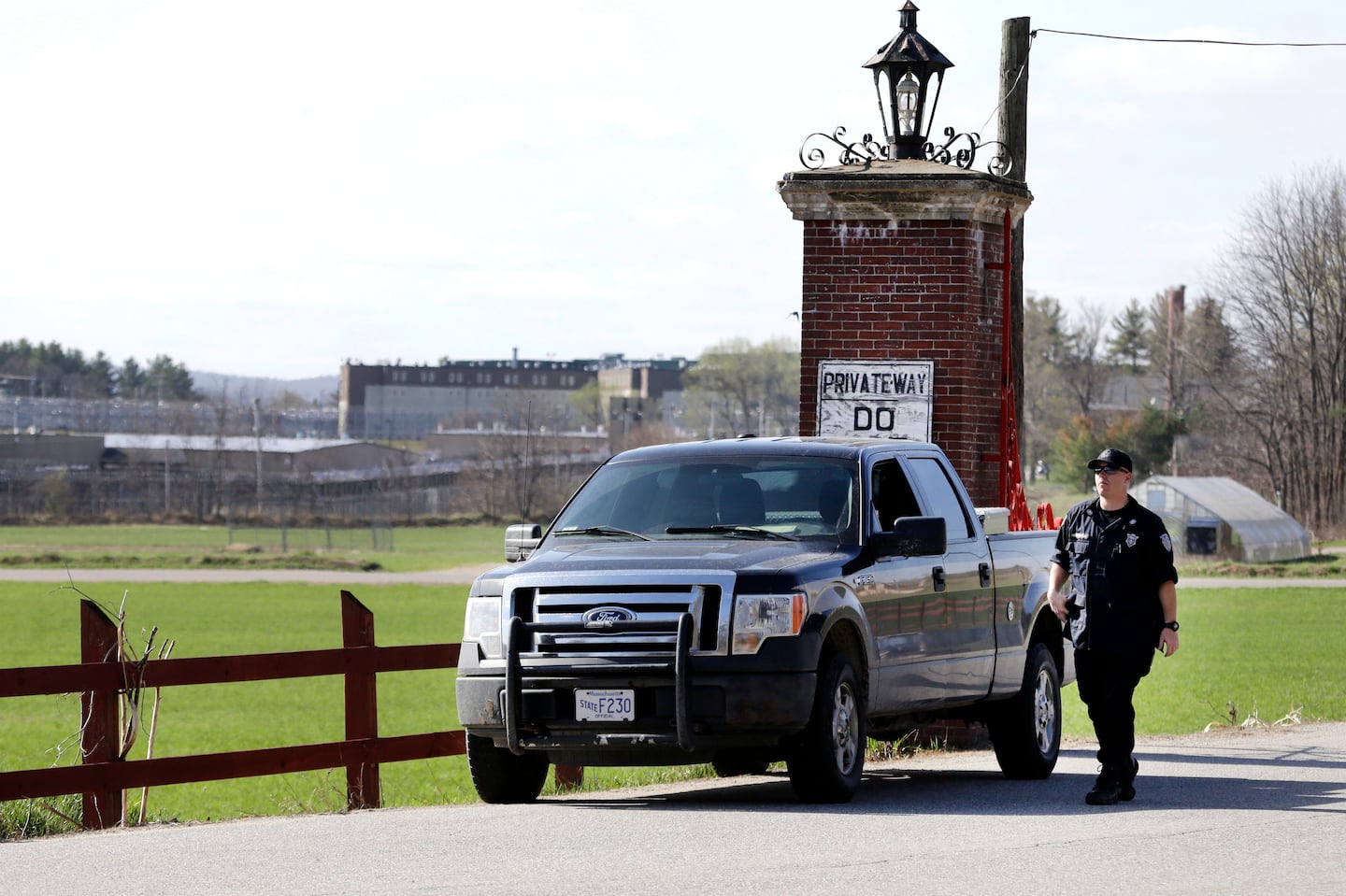 A police officer guards an entrance to the Souza-Baranowski Correctional Center in 2017.