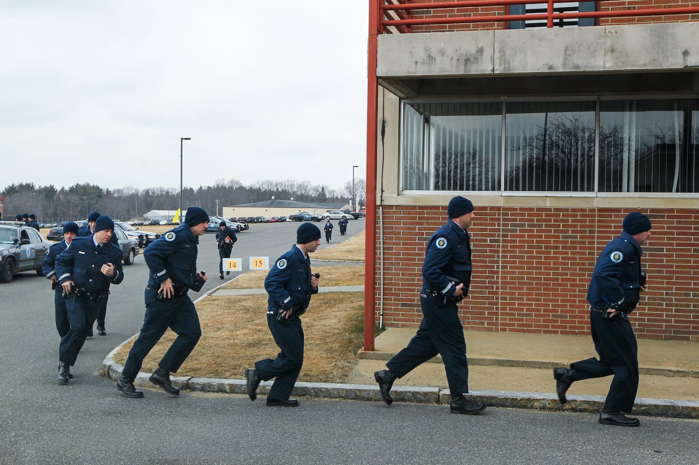 State Police trainees turned the corner of a building at the Massachusetts State Police Complex in New Braintree in 2012.