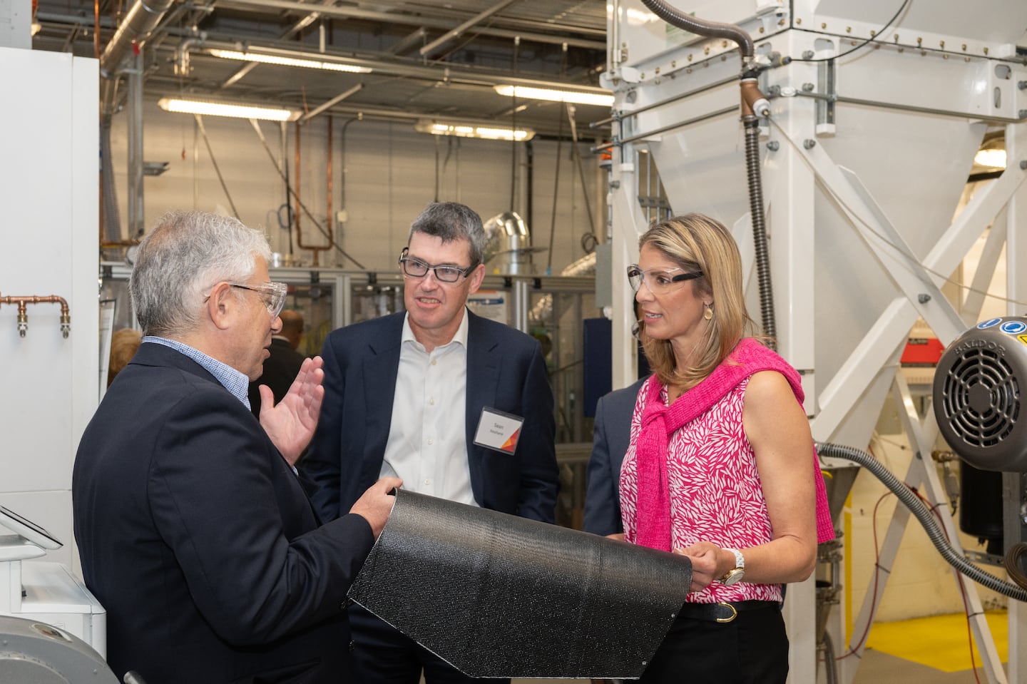 US Rep. Lori Trahan visited Cabot's research center in Billerica in June. She is seen here with Angelos Kyrlidis, technology director at Cabot (left), and Sean Keohane, president and CEO (center).