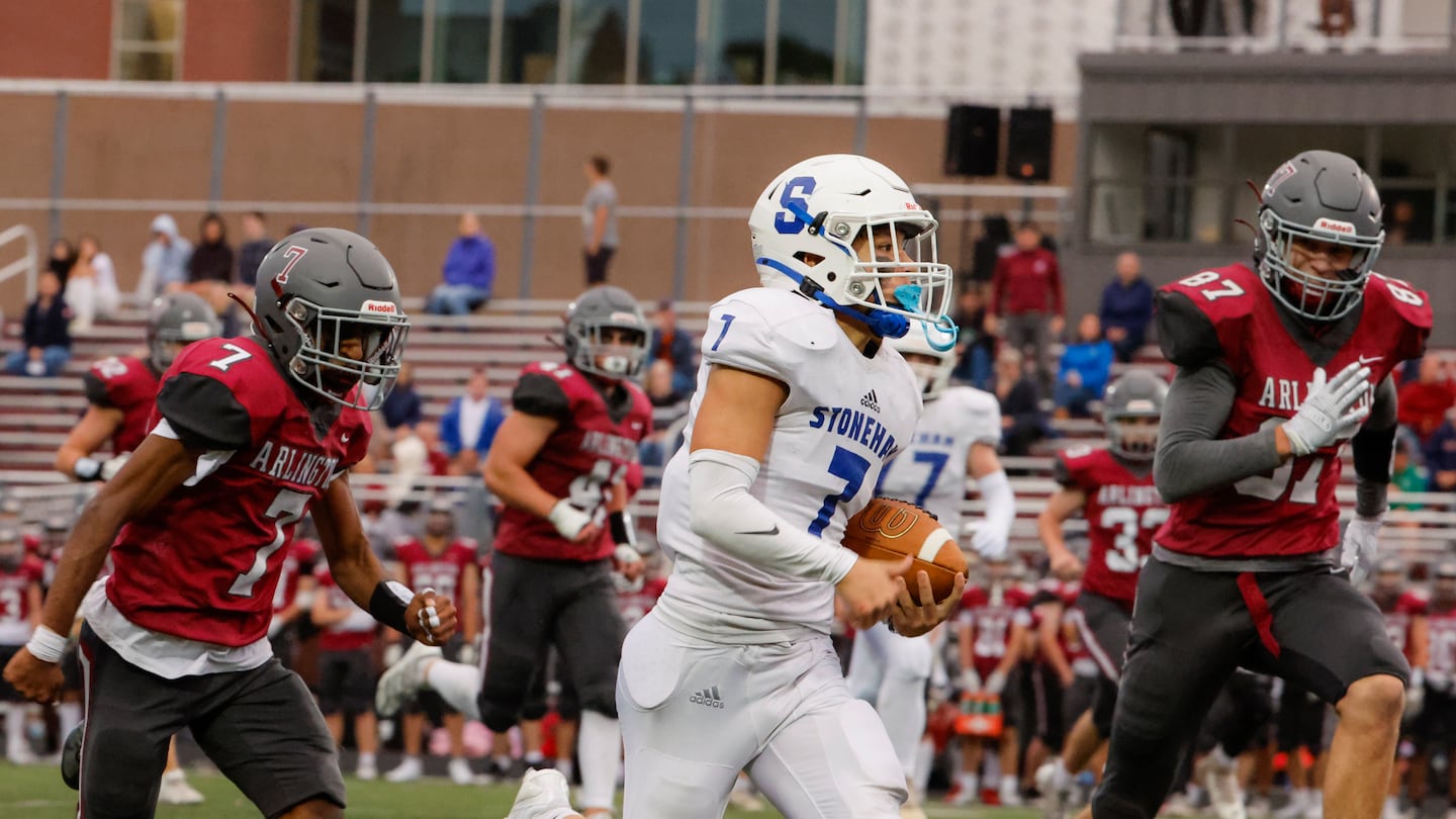 Stoneham running back Logan Tran (No. 7) leaves a slew of Arlington defenders in his wake en route to a 53-yard touchdown run in Friday's 49-21 nonleague road victory over the Spy Ponders. Tran rushed 13 times for 214 yards and 2 TDs.