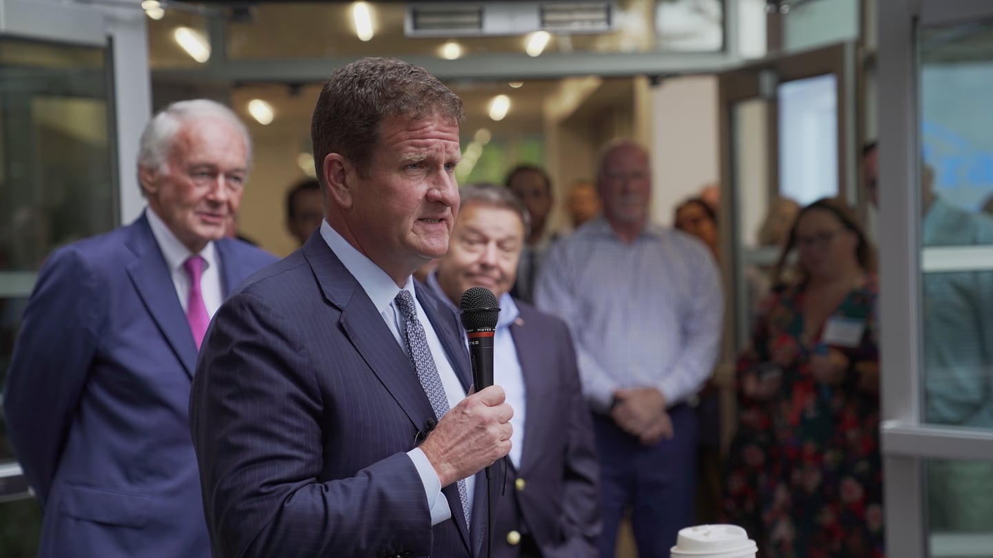 Granite CEO Rob Hale spoke at the grand opening of the company's new Quincy headquarters. He was joined by US Senator Ed Markey and Quincy Mayor Tom Koch.