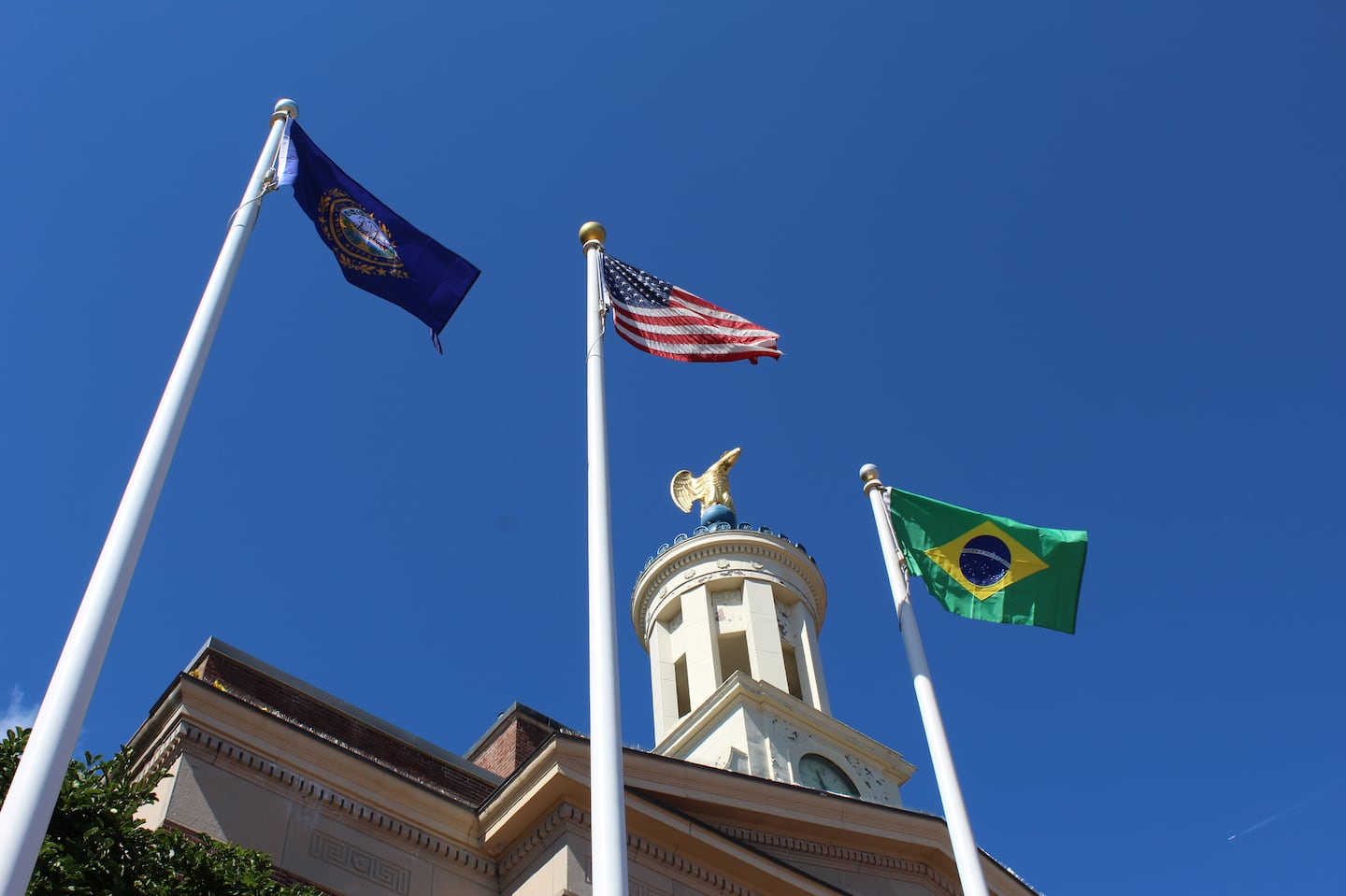 One of the flagpoles outside Nashua City Hall, shown here flying the Brazilian flag on Sept. 10, 2024, three days after Brazil's Independence Day, features a rotating array of flags in support of various causes, anniversaries, and symbols of cultural heritage. The city's refusal to fly certain flags sparked a federal lawsuit.