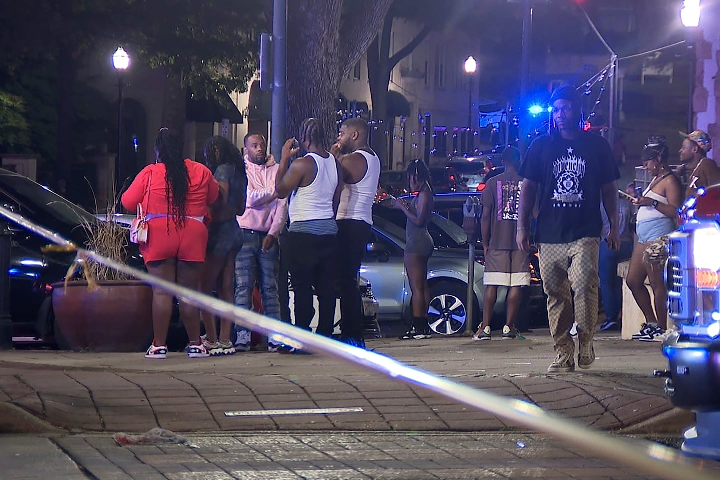 Bystanders near the scene of a shooting in Birmingham, Ala., on Sept. 22.