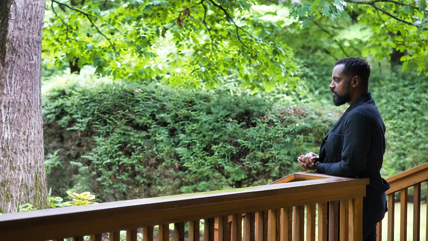 Composer Carlos Simon takes a moment to reflect backstage at Tanglewood before introducing his piece Aug. 18.