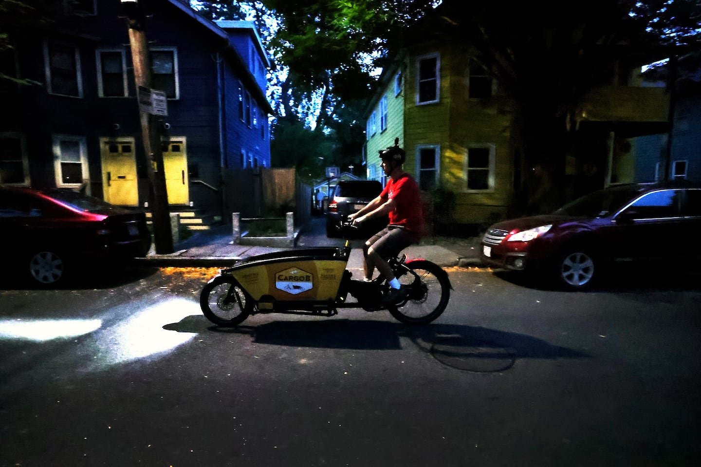 Aaron Charlwood headed to Arlington in the early morning, after picking up a rented CargoB bike in Cambridge.