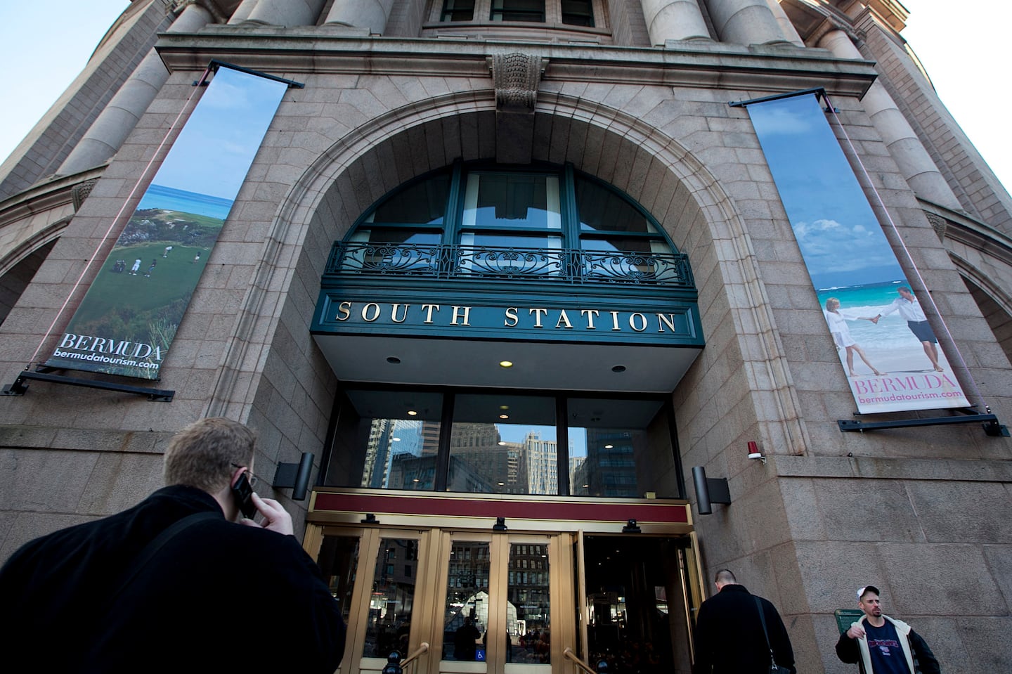 Greyhound Lines is sued by environmental foundation for its buses allegedly idling at South Station.