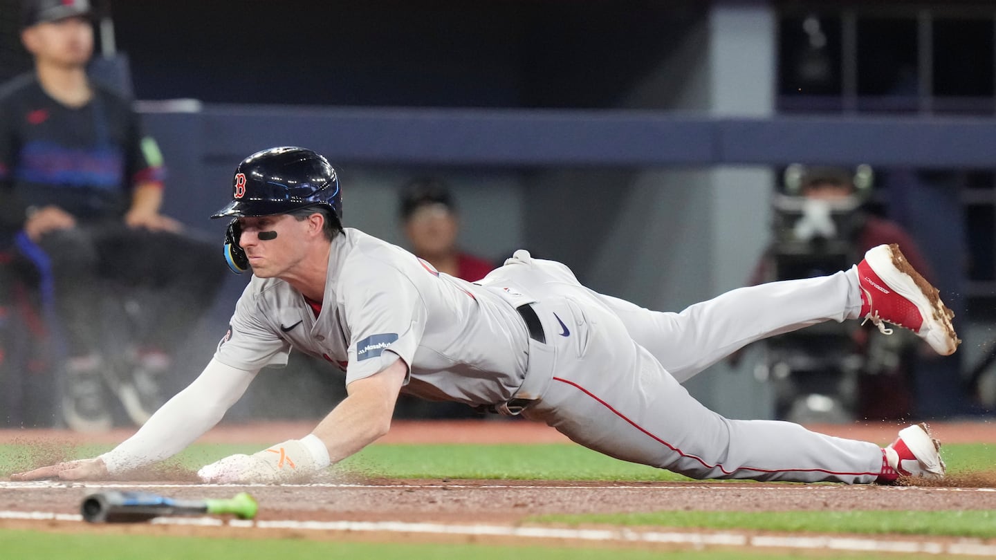 Nick Sogard dived home to give the Red Sox a 3-0 lead in the fourth inning on a Ceddanne Rafaela grounder.