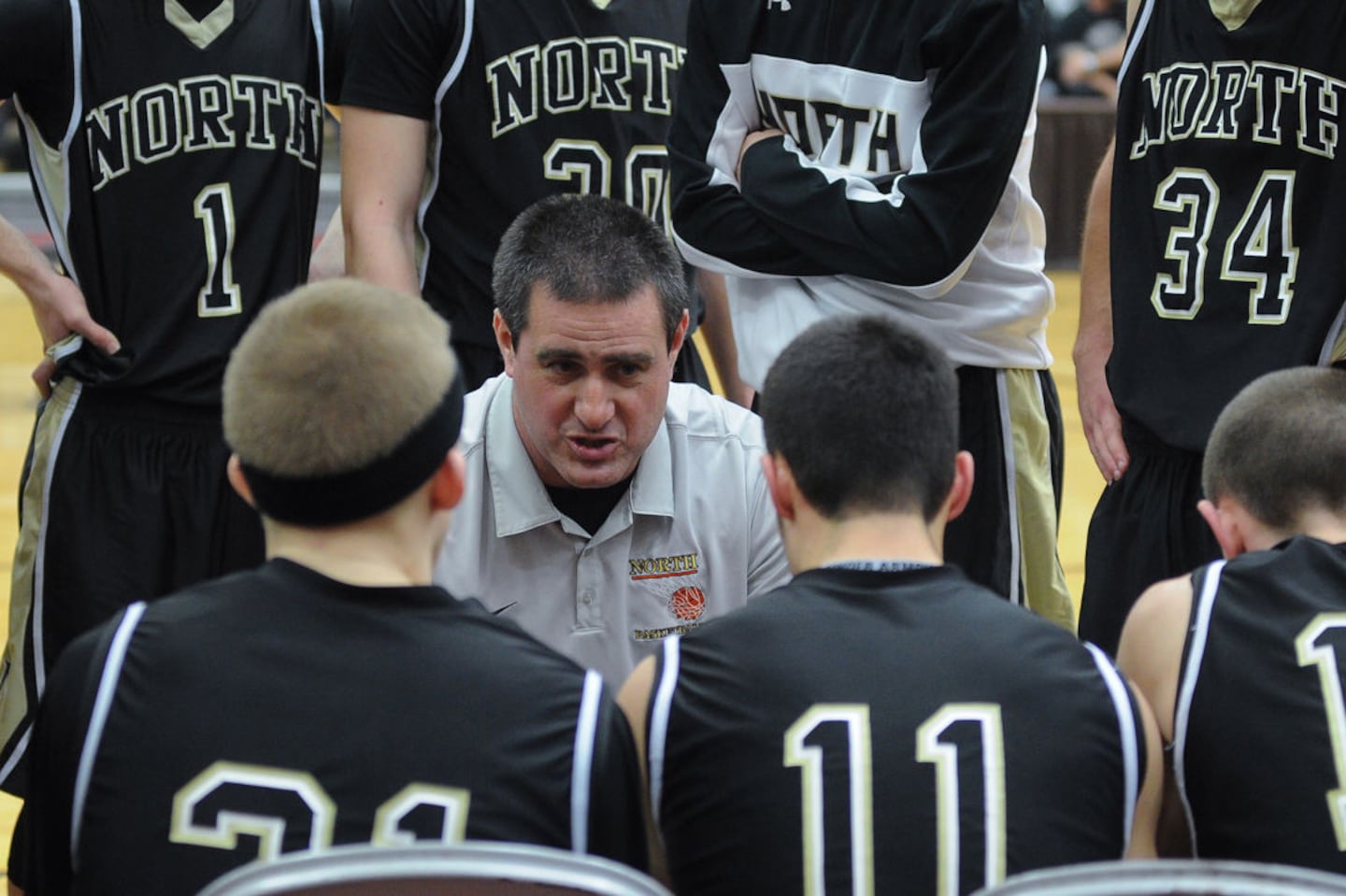 North Kingstown High School basketball coach Aaron Thomas during a game. On July 21, 2022, he was was charged with second-degree child molestation and second-degree sexual assault in connection with the naked “body fat tests” he allegedly performed on student athletes for years.