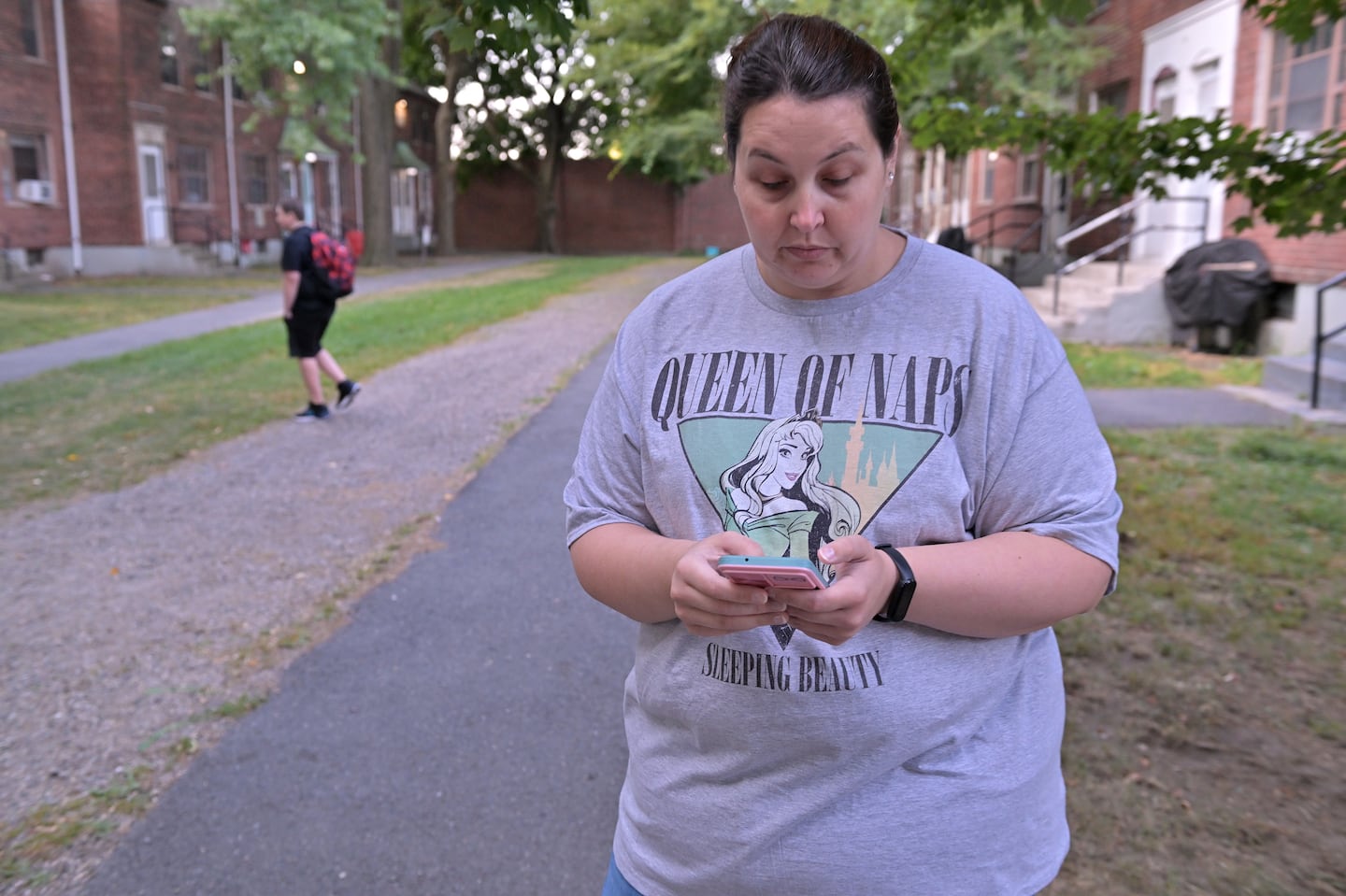 Cheryl Buckman and her son Landen Buckman, 11, a sixth-grade student in the Boston Public Schools, tracked the progress of Landen's bus on the Zūm smartphone app, which displayed a gradually increasing delay for Landen's bus on the first day of school. The bus ultimately skipped Buckman's stop, passing less than 500 feet away. The family has experienced bus problems regularly enough that a neighbor was standing by to drive Landen when the bus did not pick him up.