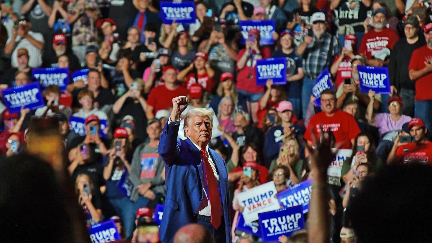 Former president Donald Trump gestures after his speech during a campaign rally at the Indiana University of Pennsylvania, on Sept. 23.