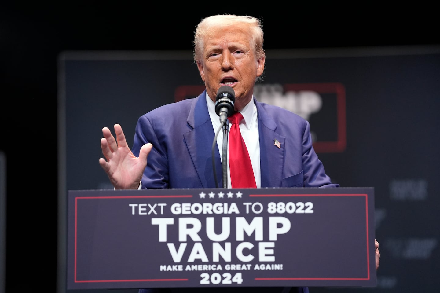 Former president Donald Trump speaks about the tax code and manufacturing at the Johnny Mercer Theatre Civic Center, Tuesday, Sept. 24, 2024, in Savannah, Ga.