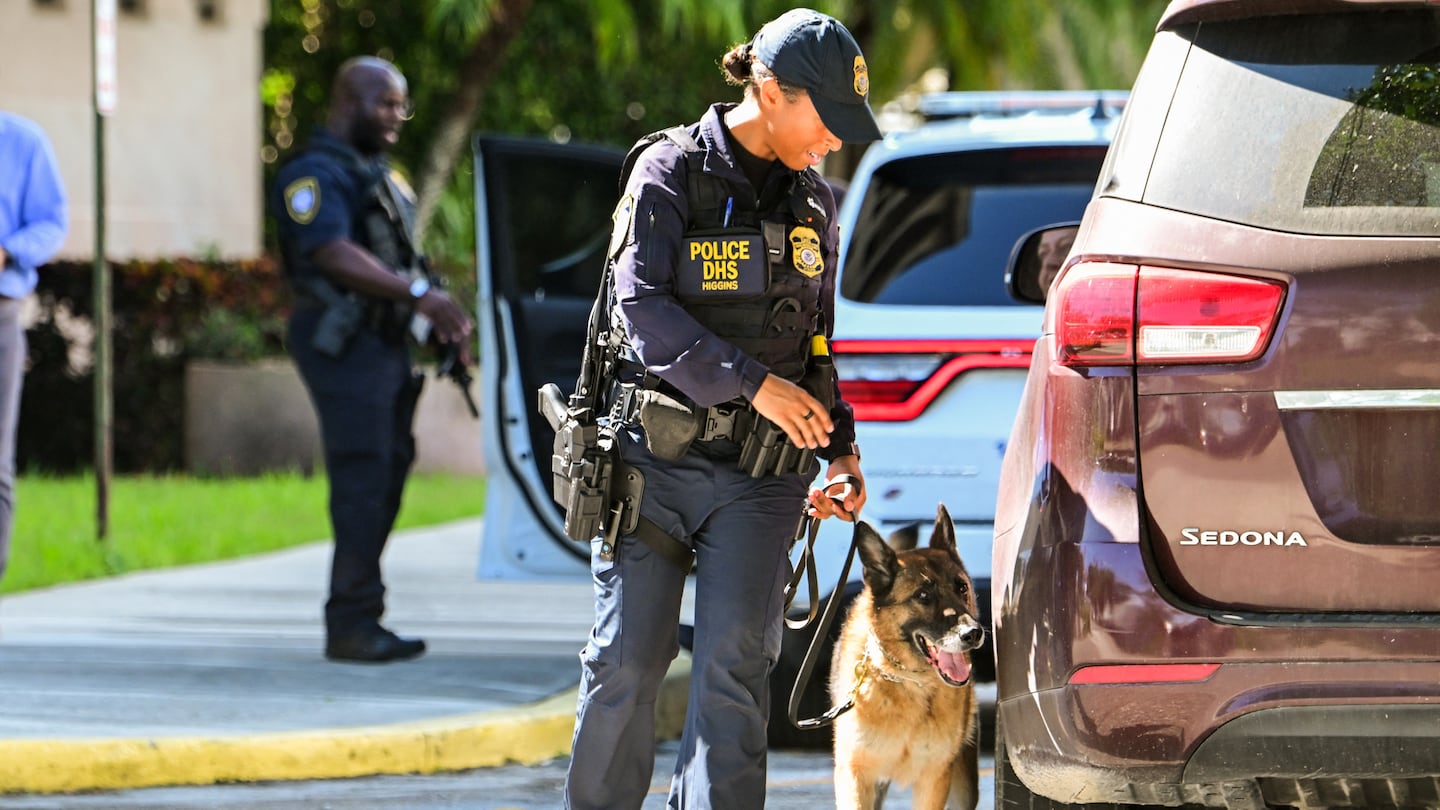 Department of Homeland Security police officers stand watch outside the Paul G. Rogers Federal Building and US Courthouse in West Palm Beach, Florida, on Sept. 23, 2024.