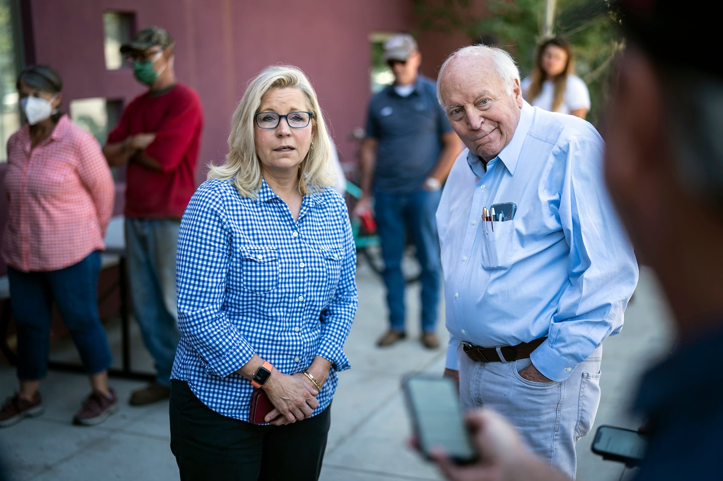 Then-Representative Liz Cheney and her father, former vice president Dick Cheney, arrived to vote in Jackson Hole, Wyo., in the Republican primary election on Aug. 16, 2022. They are part of a growing list of Republican former elected and administration officials who have publicly said they will vote for Democrat Kamala Harris for president.