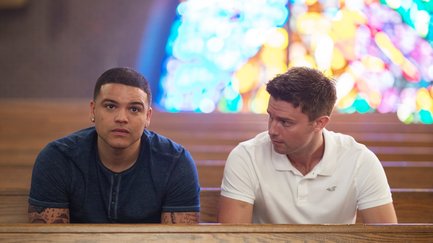 A still from FX’s "American Sports Story: Aaron Hernandez" episode 3, "Pray the Gay Away." Pictured: Josh Rivera as Aaron Hernandez, Patrick Schwarzenegger as Tim Tebow.