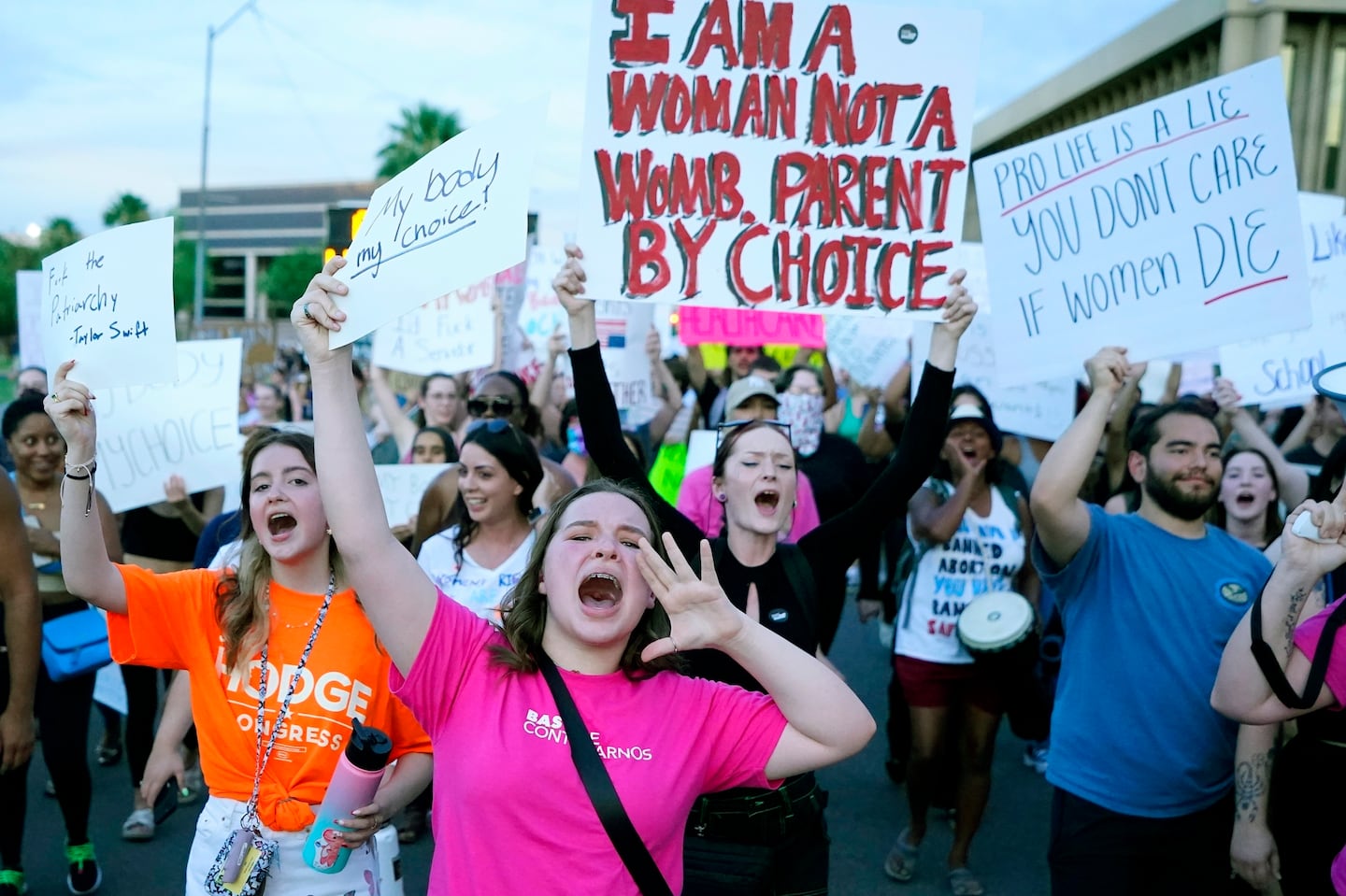 Protesters joined thousands marching around the Arizona Capitol in Phoenix, protesting the US Supreme Court's decision to overturn Roe v. Wade, June 24, 2022.