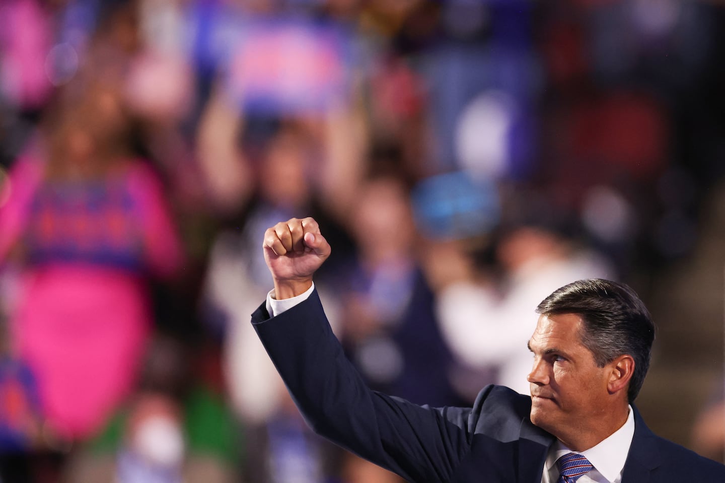 Former Georgia lieutenant governor Geoff Duncan raised his fist after speaking on the third day of the Democratic National Convention in Chicago, on Aug. 21.