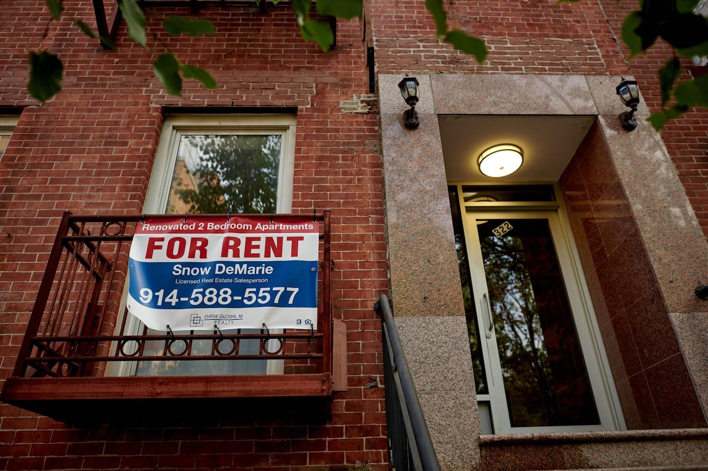 A "For Rent" sign outside an apartment building in the East Village neighborhood of New York in 2022.