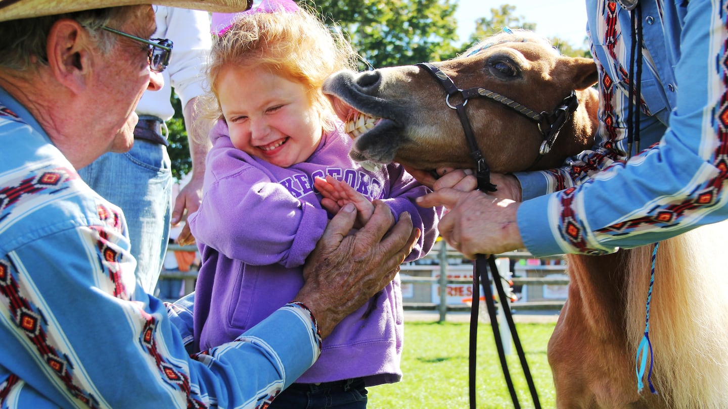 Girl meets pony at Topsfield Fair.