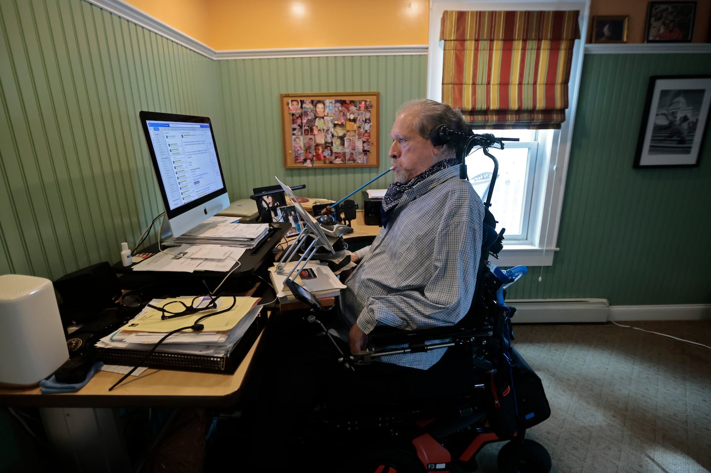 Disability rights advocate Charlie Carr in his home office.