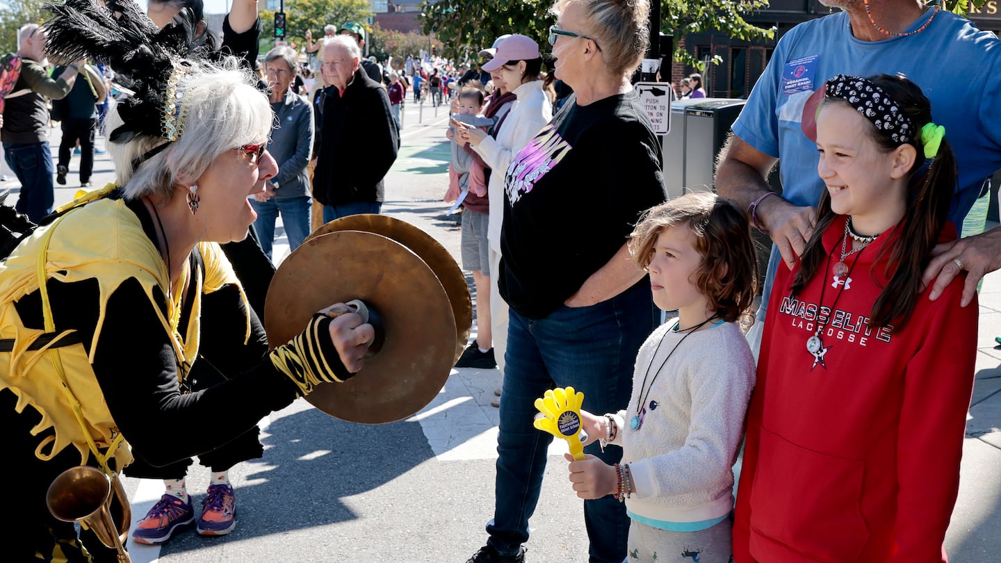 The 2024 edition of the HONK! Festival comes to the Somerville and Cambridge areas for Oct. 4-6. Pictured: Attendees and a performer at the 2023 edition of the outdoor performance weekend.