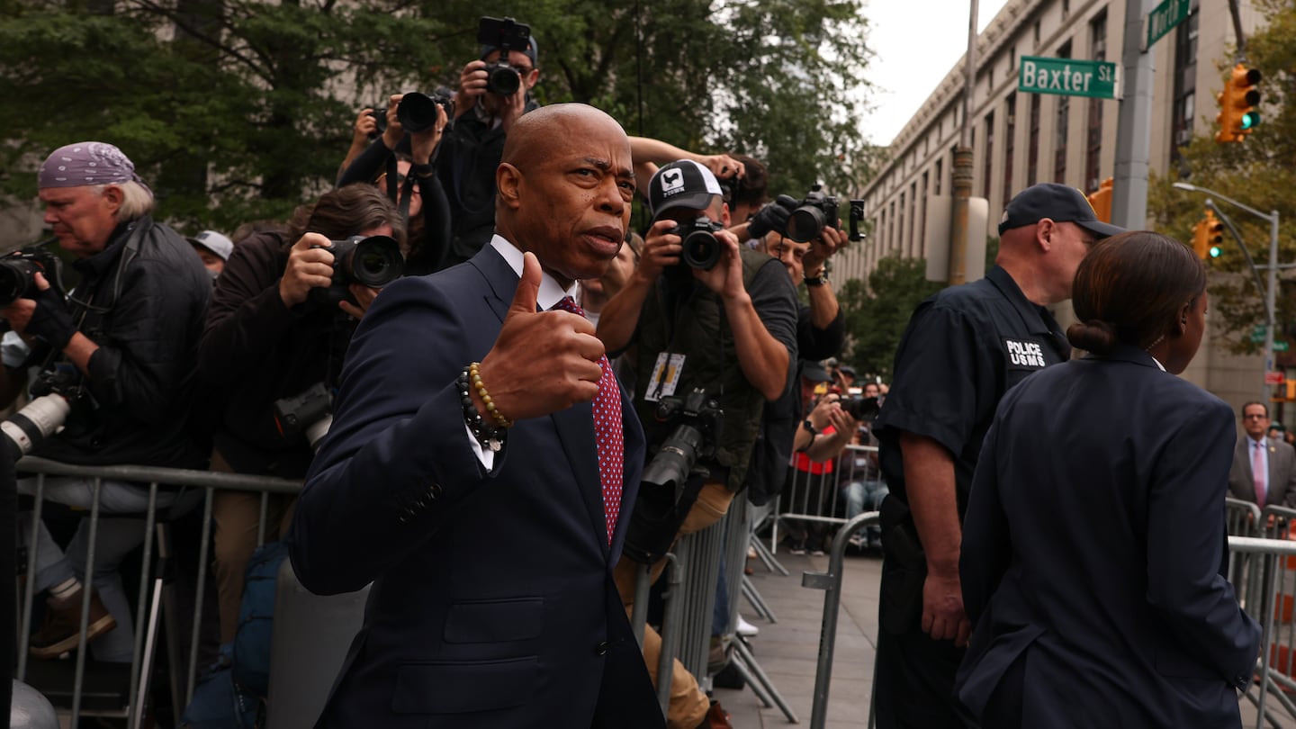 New York City mayor Eric Adams motions as he departs Manhattan federal court, Friday, Sept. 27, 2024, in New York.