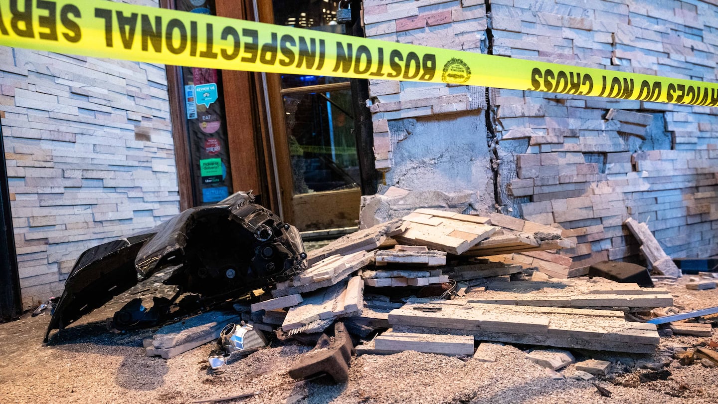 Damage at the Genki Ya sushi restaurant, where three pedestrians were hit by the car that hit the restaurant Friday.