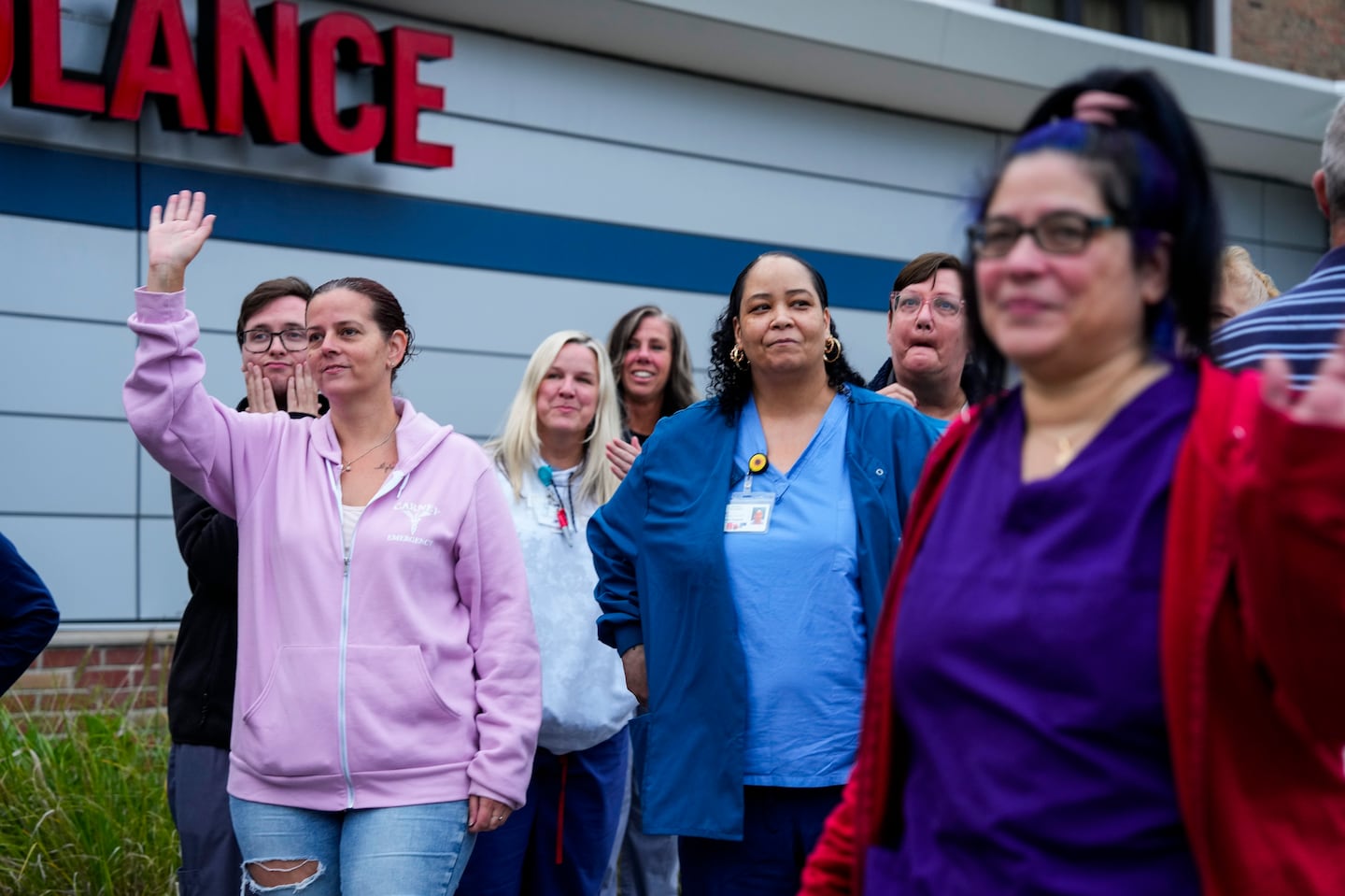 Employees waved goodbye as they left the hospital after the final call on the last day at the emergency department at Carney Hospital in Dorchester.