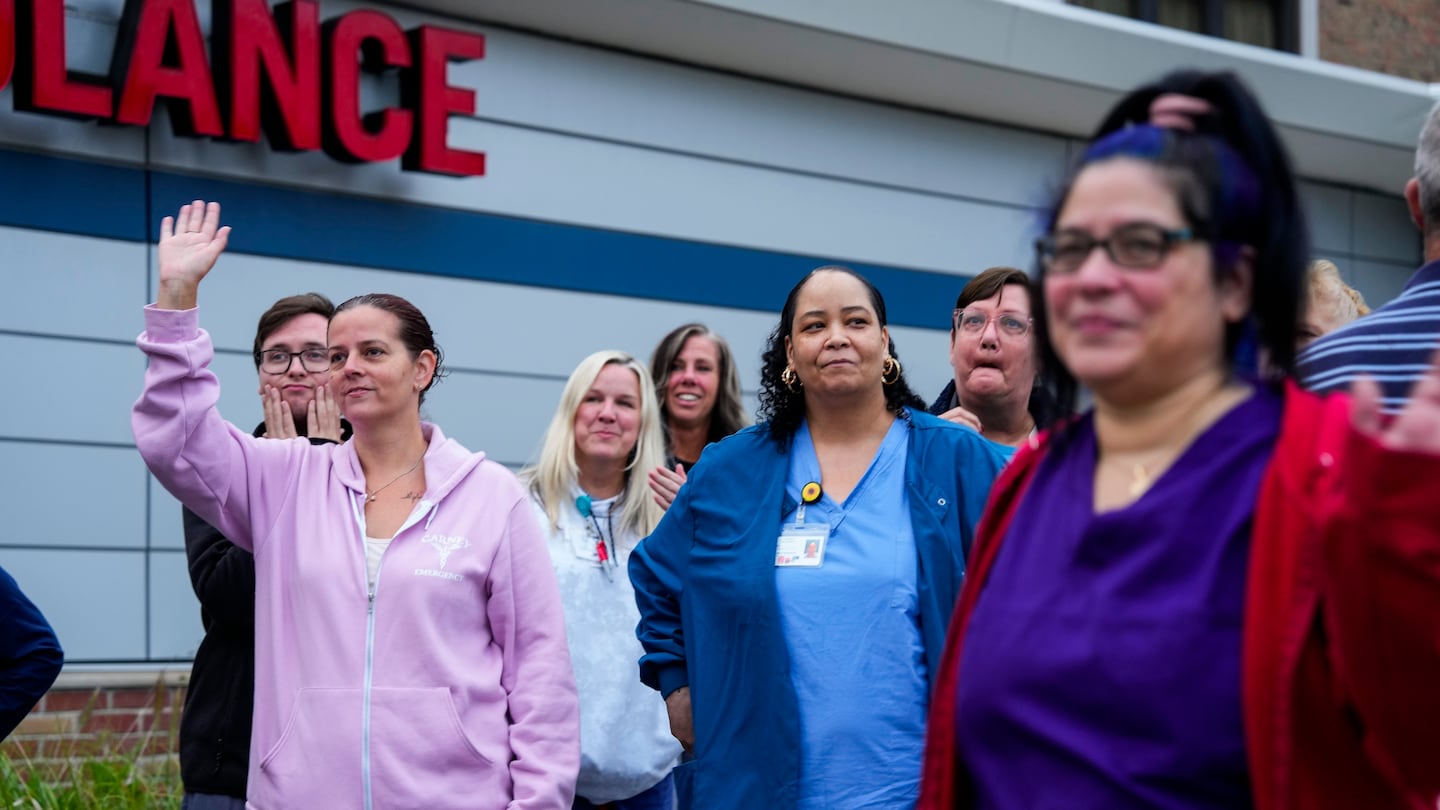 Employees waved goodbye as they left the hospital after the final call on the last day at the emergency department at Carney Hospital in Dorchester.