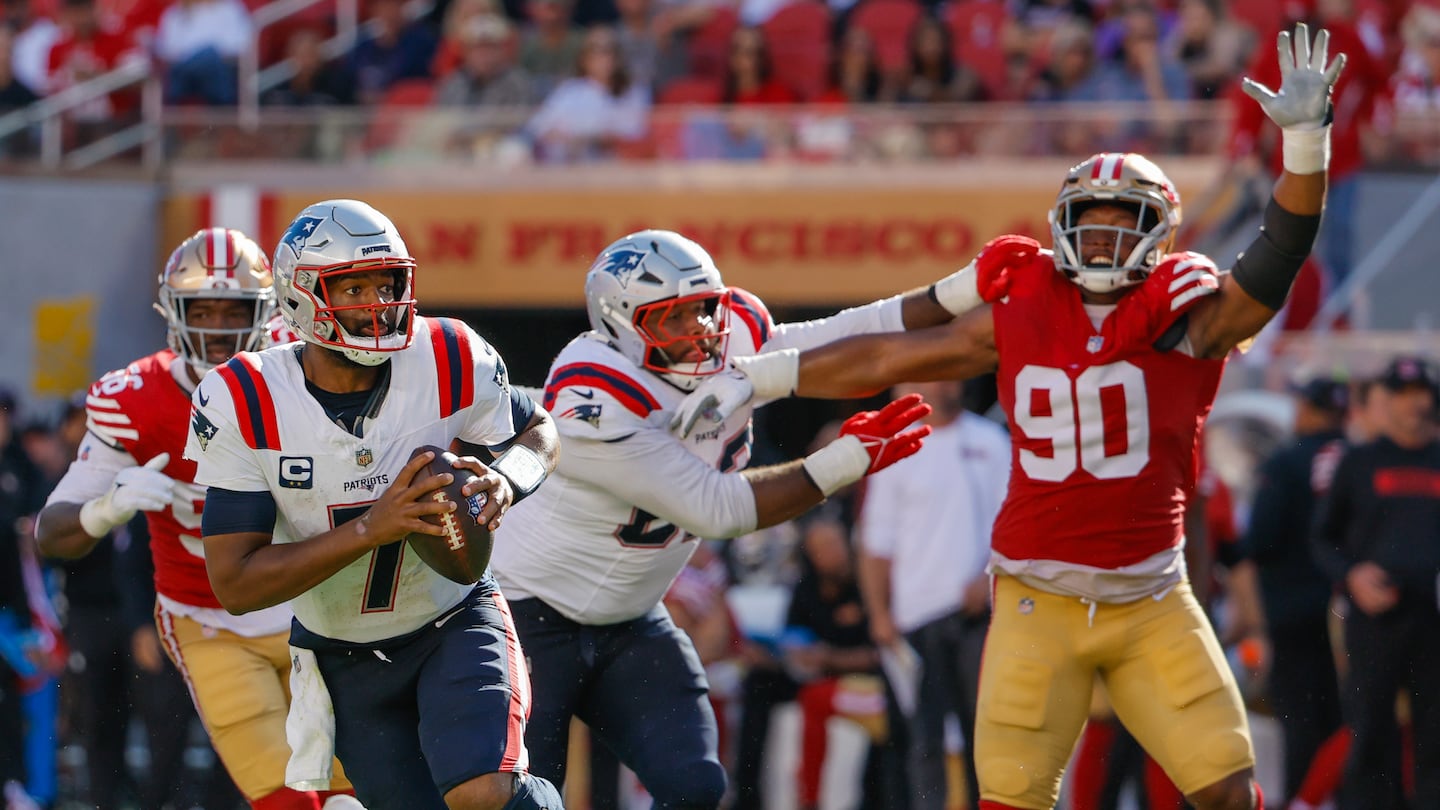 Pressure from the 49ers had Patriots quarterback Jacoby Brissett scrambling.