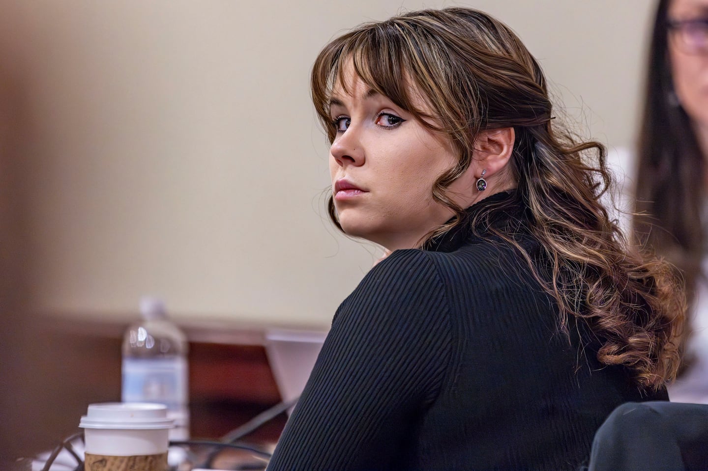 Hannah Gutierrez-Reed, the former armorer for the Western film "Rust," listens to closing arguments in her trial at district court, March 6, in Santa Fe, N.M.