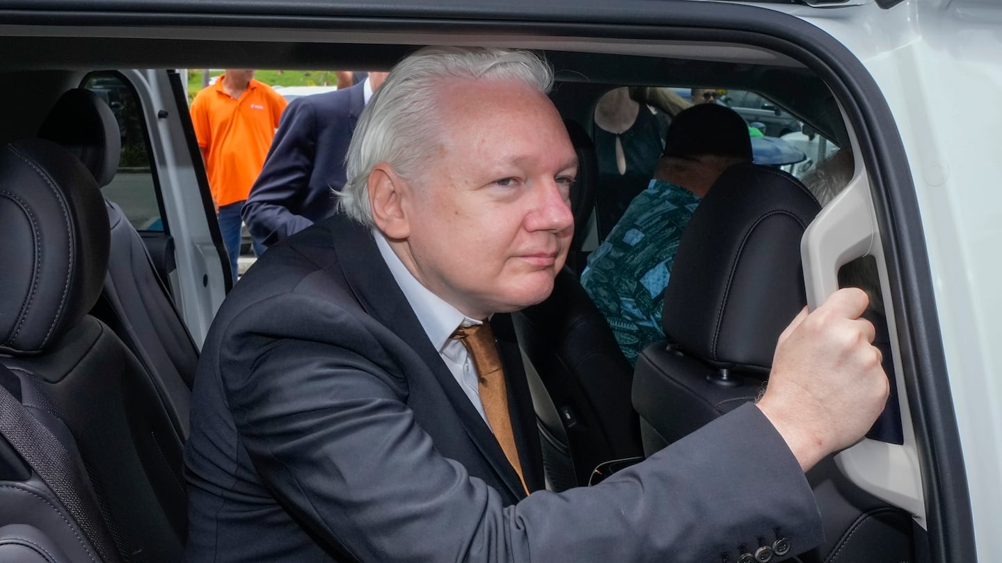 WikiLeaks founder Julian Assange leaves federal court in Saipan, Mariana Islands, on June 26.