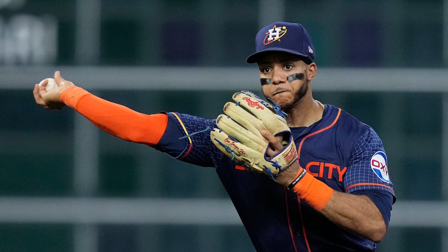 A former Classical High School star, Houston Astros shortstop Jeremy Peña throws out Seattle Mariners' J.P. Crawford on a ground ball during the fifth inning of a baseball game on Sept. 23, 2024, in Houston.