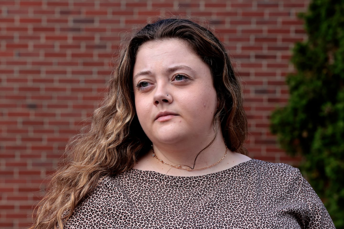 Samantha Bailey poses for a portrait in Manchester, N.H. Bailey, a legal gun owner in New Hampshire, was charged with unlicensed possession of a firearm after a car accident in Massachusetts.