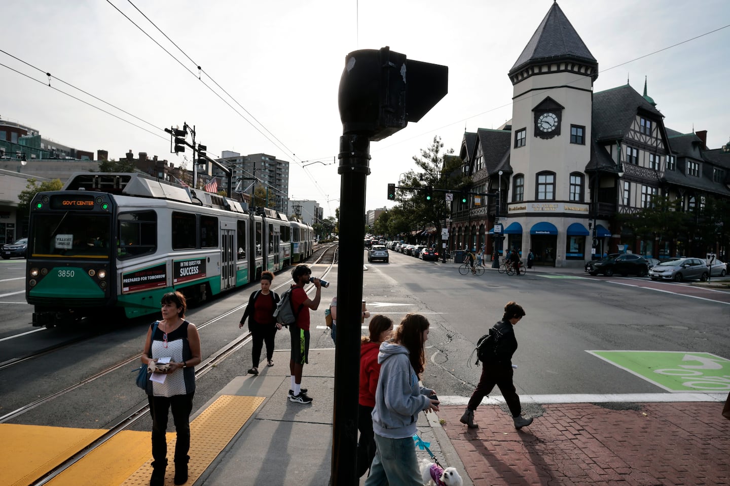 Pedestrians navigate Coolidge Corner in Brookline, MA on September 22, 2023.