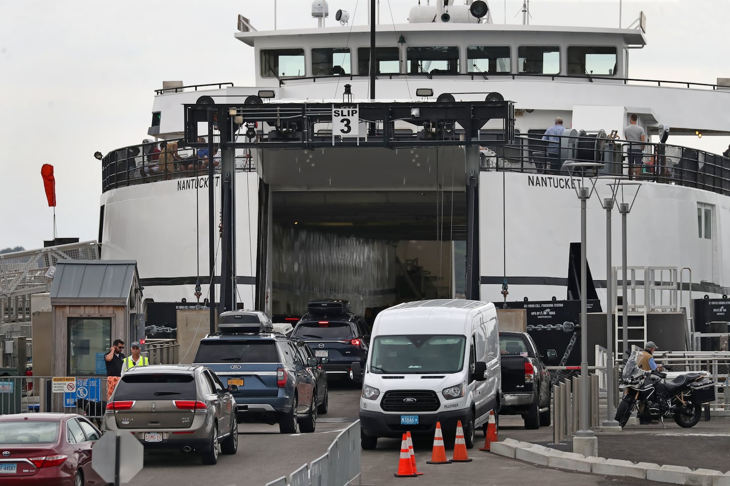 Vehicles prepared to board a Steamship Authority ferry in Woods Hole in August 2021.