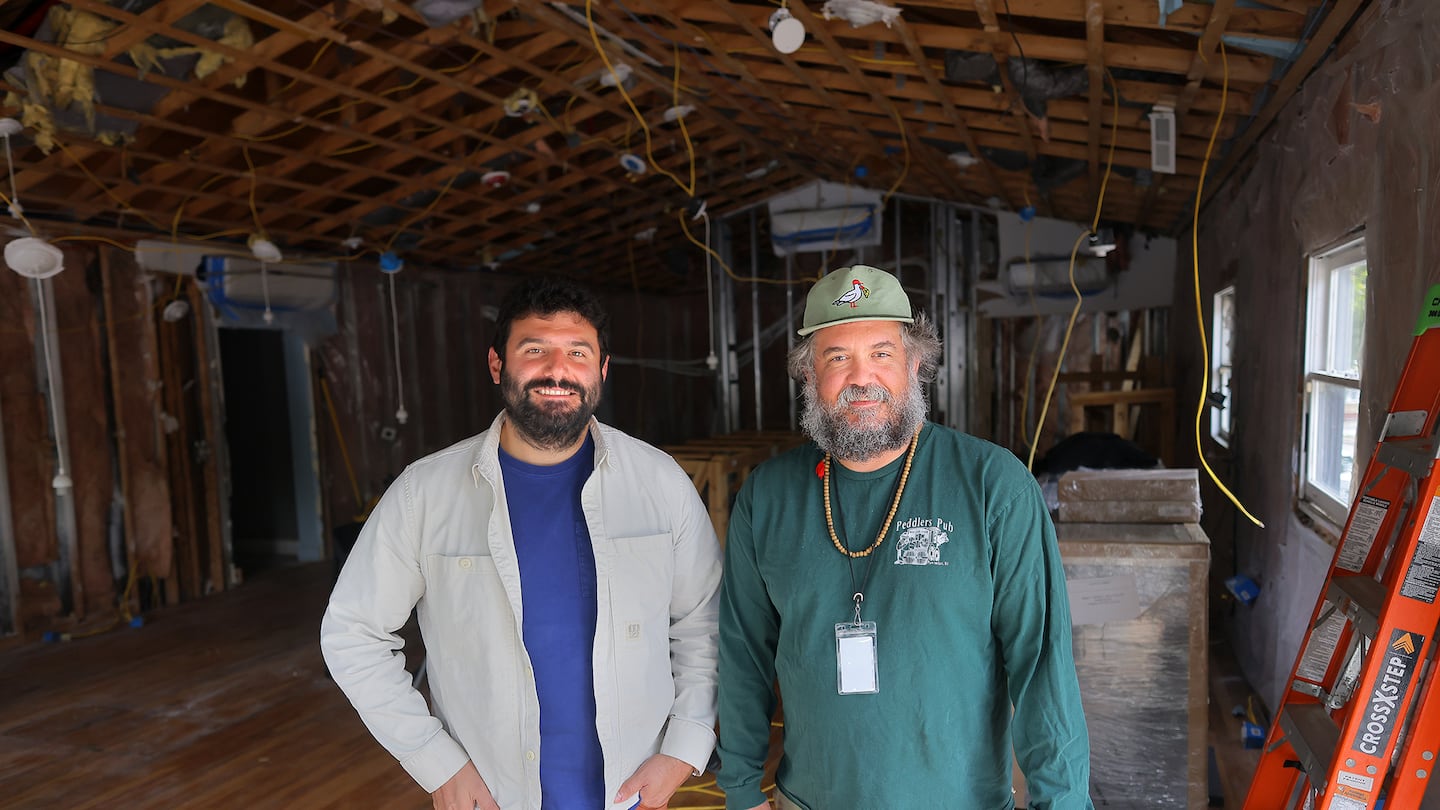 Co-owners of the bar/restaurant Club Frills Robert Andreozzi, left, and Jesse Hedberg stand in the space, which they hope to open in January of 2025.