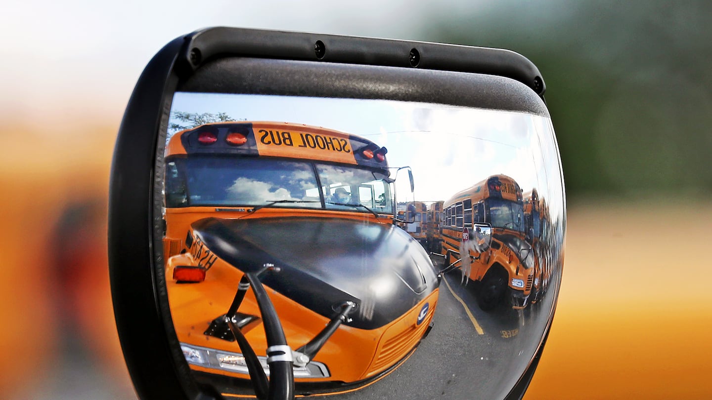 Drivers were getting ready a day before the beginning of the school year at the bus lot on Freeport Street in Dorchester in September 2021.