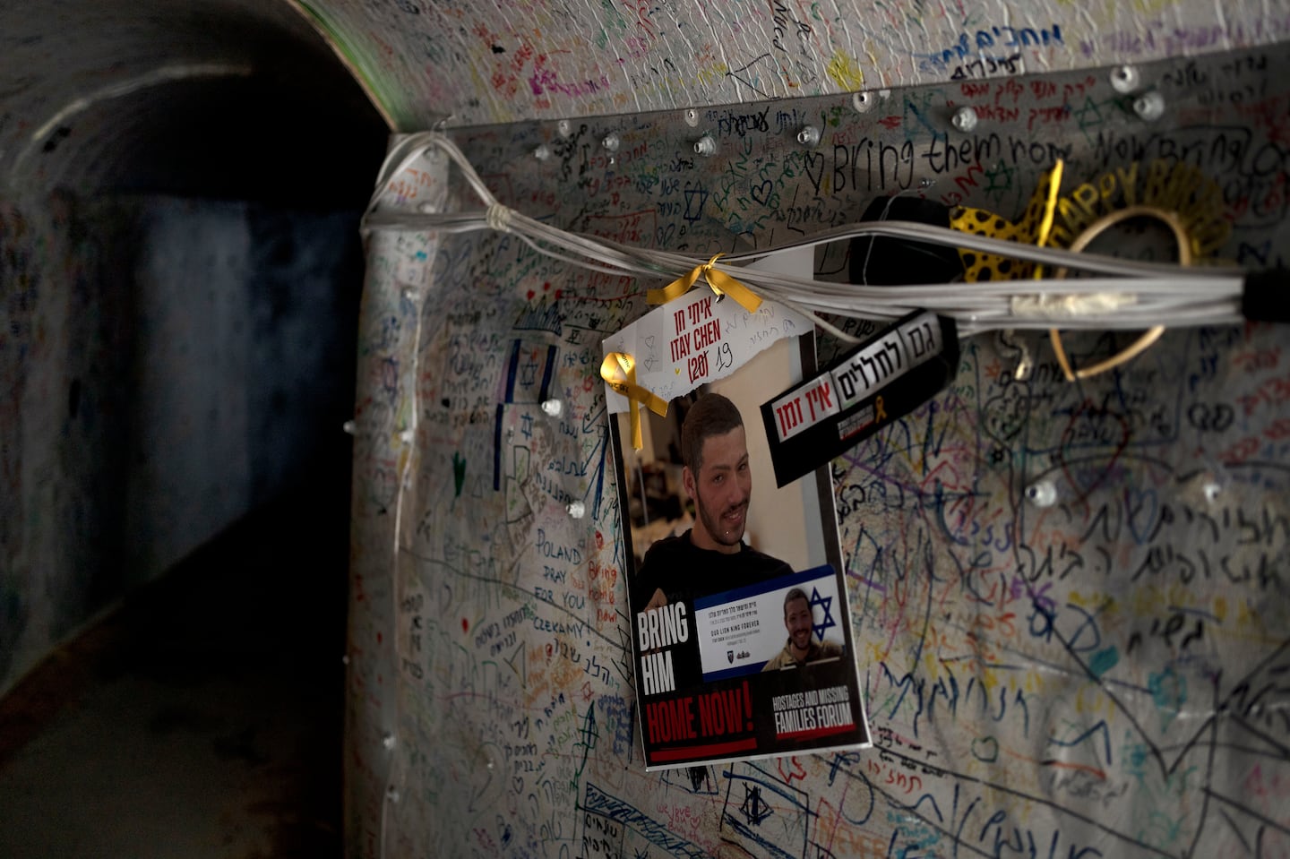 A poster depicting Itay Chen hung in an installation representing a tunnel in the Gaza Strip, in Tel Aviv, May 8.