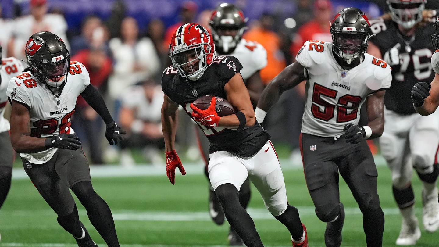 Falcons wide receiver KhaDarel Hodge gets behind the Tampa Bay defense to score the winning score in overtime, his second career touchdown.