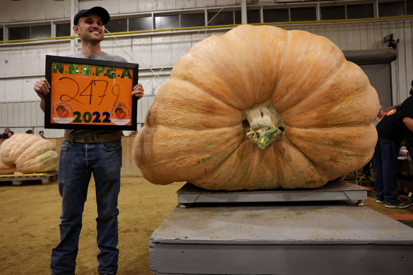 In 2022, Jamie Graham, of Tyngsboro, celebrated his record-setting 2,480 pound winner at the Topsfield Fair.  This year's fair opens Friday with the 40th Annual All New England Giant Pumpkin Weigh-Off.