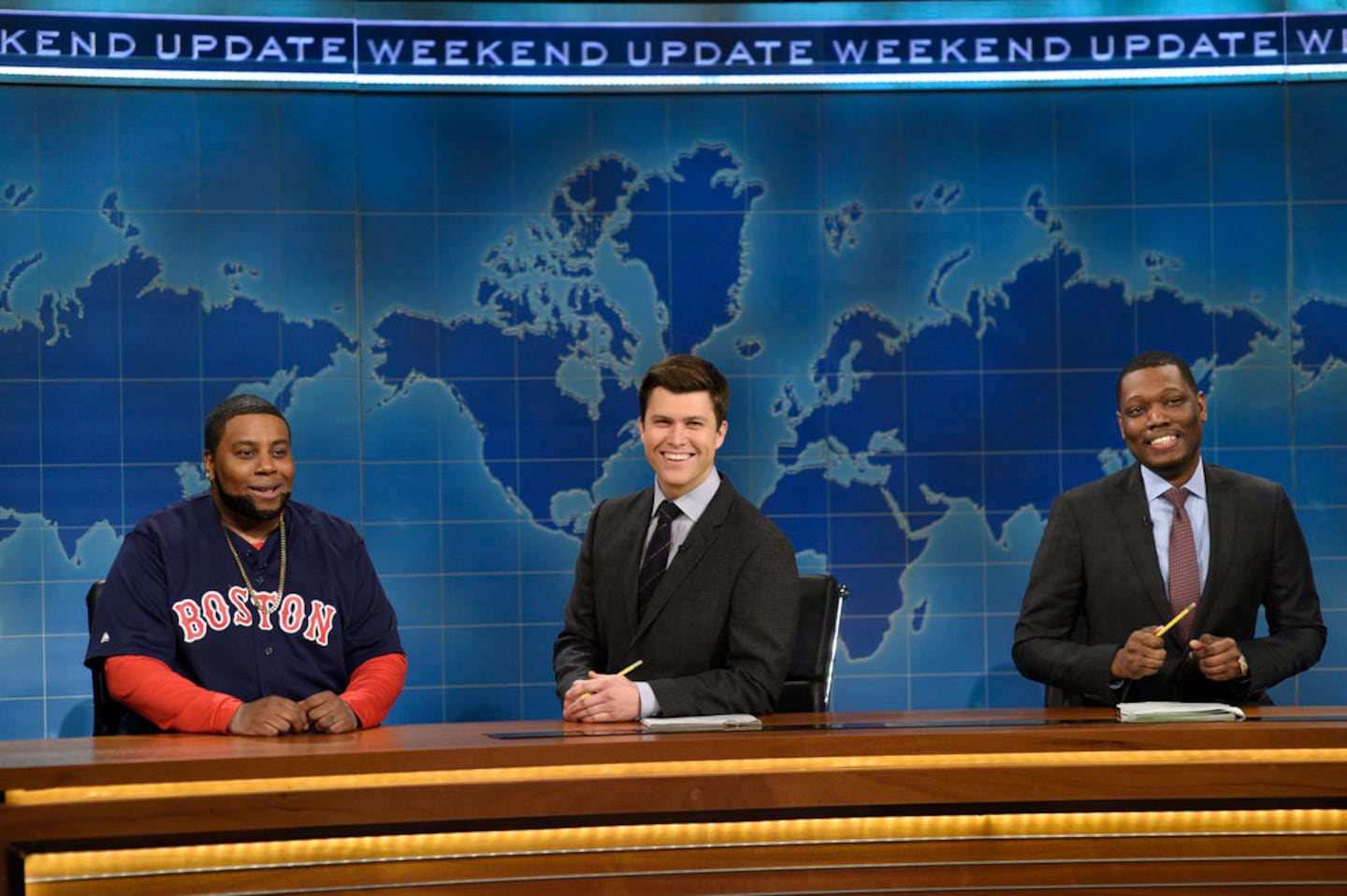 From left: Kenan Thompson as David Ortiz, Colin Jost, and Michael Che during Weekend Update on "Saturday Night Live" in 2017.