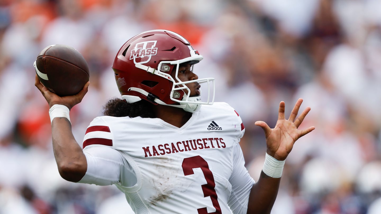 UMass quarterback Taisun Phommachan completed 15 of 30 passes for 263 yards and a pair of touchdowns in a 34-20 loss Saturday at Northern Illinois.