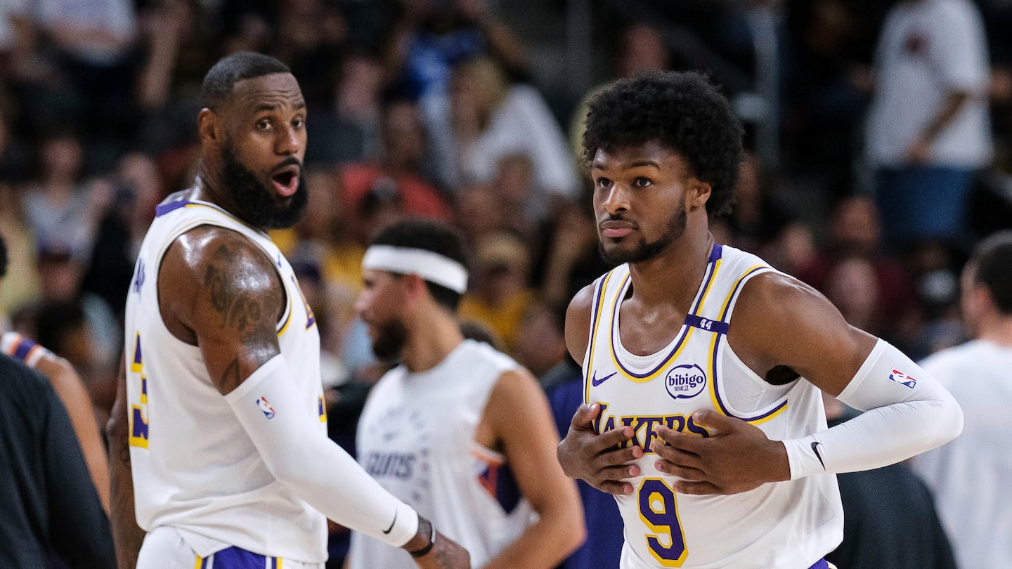 LeBron James and Bronny James became the first father-son to share an NBA court during Sunday's preseason game.