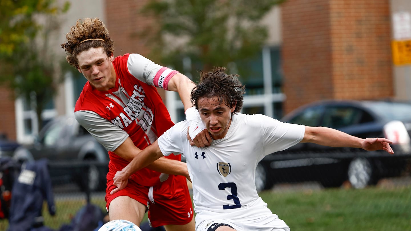 Wakefield's Jack Millward (left), battling Lexington’s Dillon Noonan (3) for ball possession in Monday's Middlesex League clash, has a team-leading 17 goals.