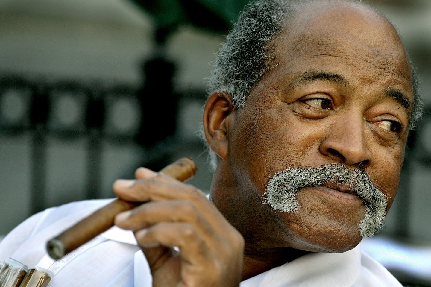 Luis Tiant, shown in 2016, was rarely seen without the stogie.