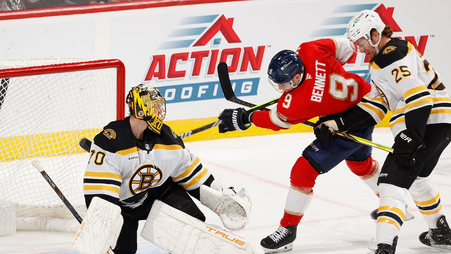 Sam Bennett scores the first of his two goals, knocking a rebound past new Bruins goaltender Joonas Korpisalo in the first period.