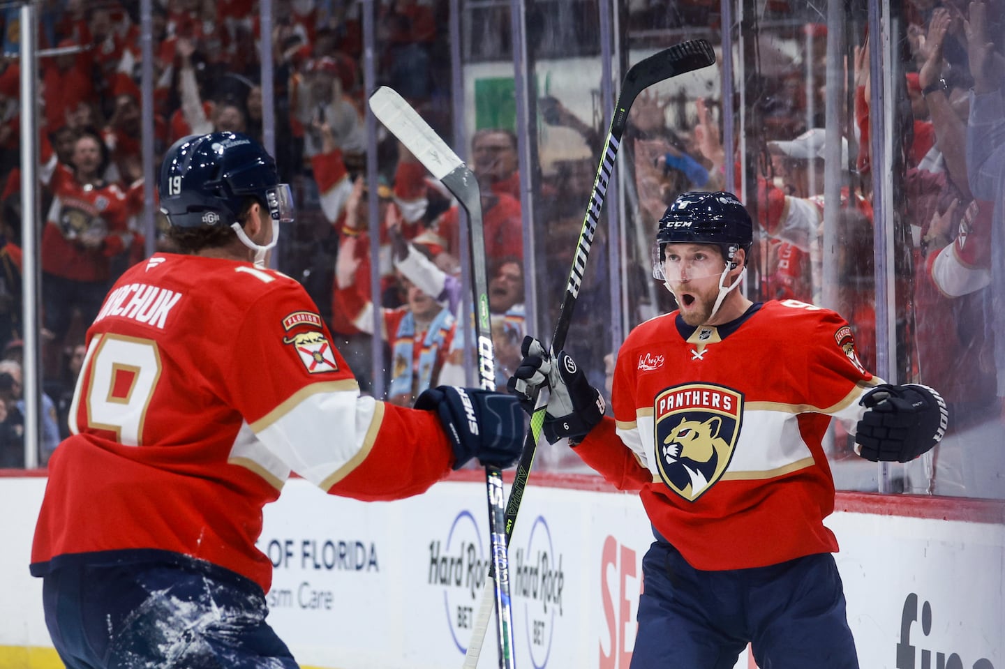 Sam Bennett, Matthew Tkachuk, and the Panthers celebrated six goals on opening night against the Bruins.