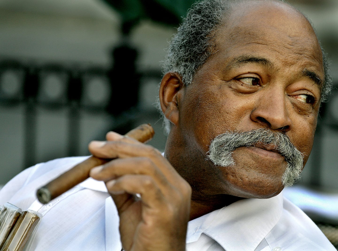 Luis Tiant, shown in 2016, was rarely seen without the stogie.