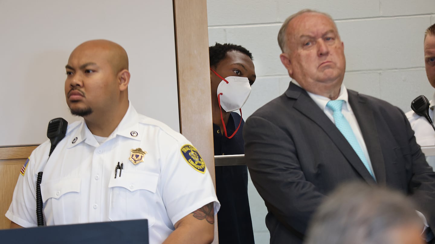 Trevor Bady, 21, in mask, was arraigned in Lowell District Court in June  the killing of Ahliana M. Dickey, the 15 year old girl who was found dead of gunshot wounds on the day of her eighth grade graduation.